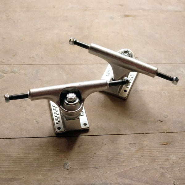 Silver Ace Classic Skateboard Trucks by Ace Trucks, showing the durable trucks with branding and mounting hardware.