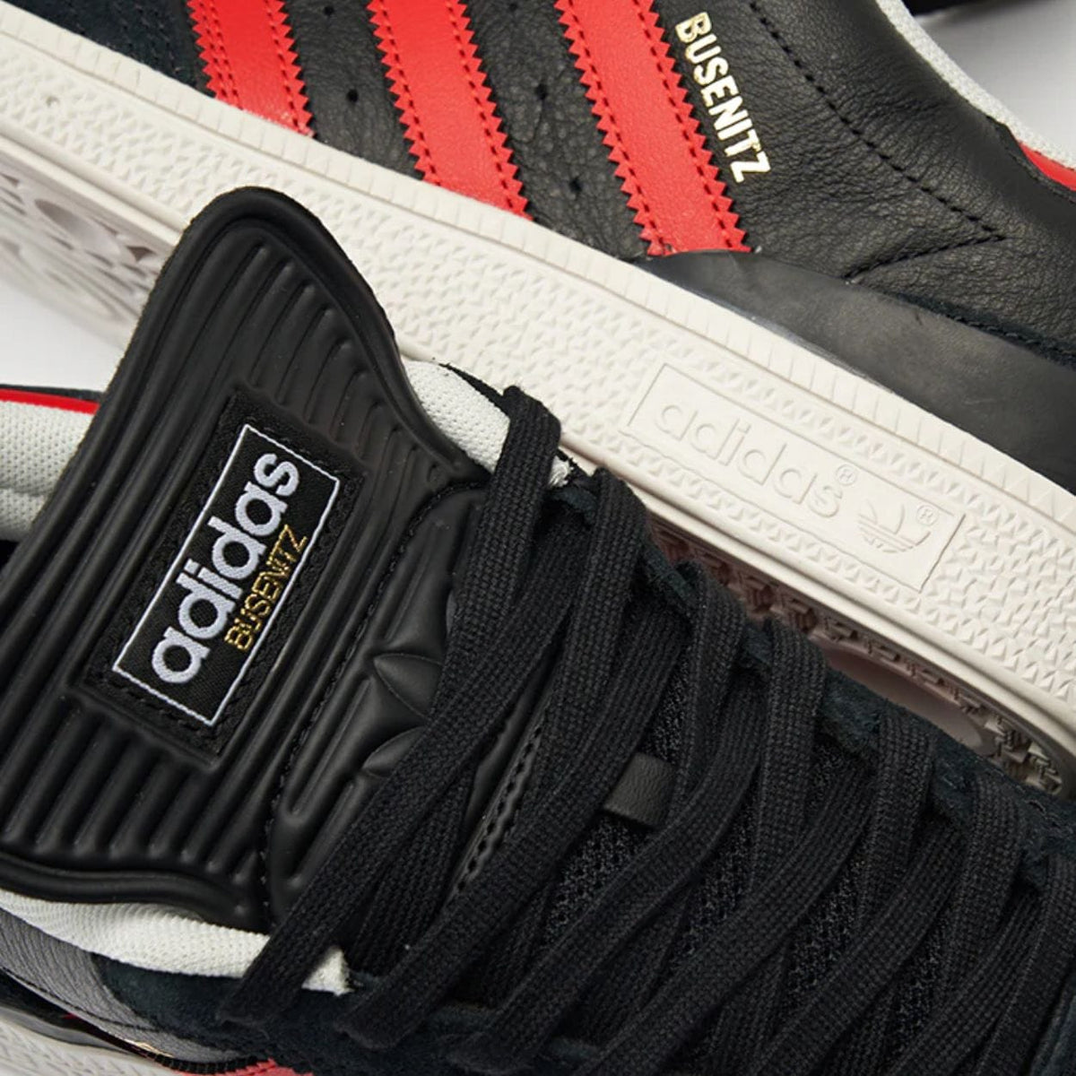 Adidas Skateboarding Busenitz Pro skate shoes in black, red, and white with classic design and skate-ready features.