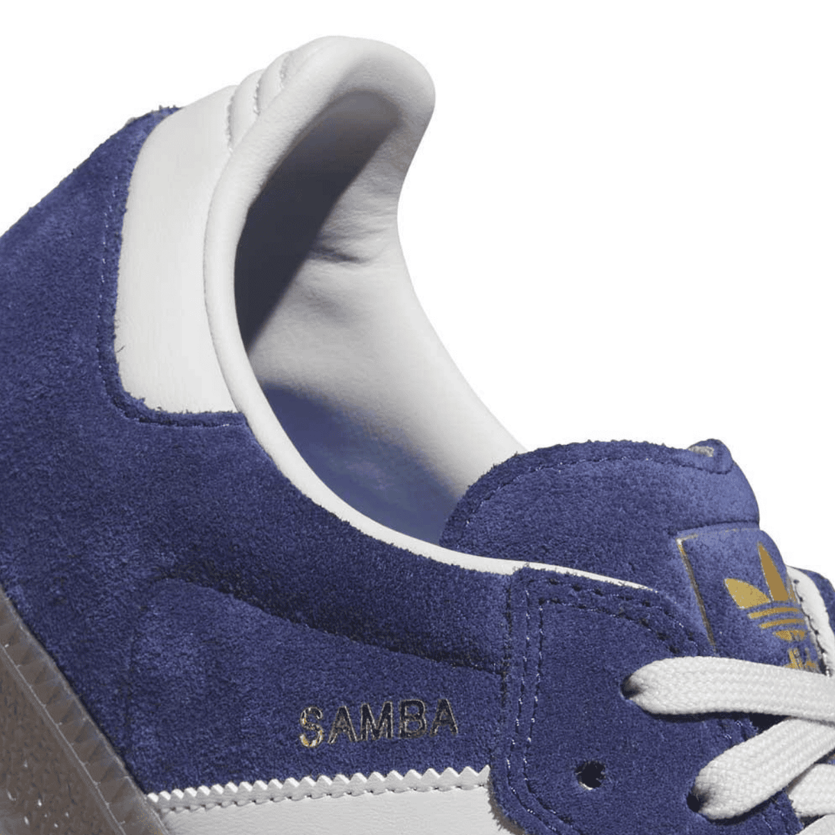 Adidas Skateboarding Samba ADV skate shoes in dark blue and grey with white soles, designed for durability and style.
