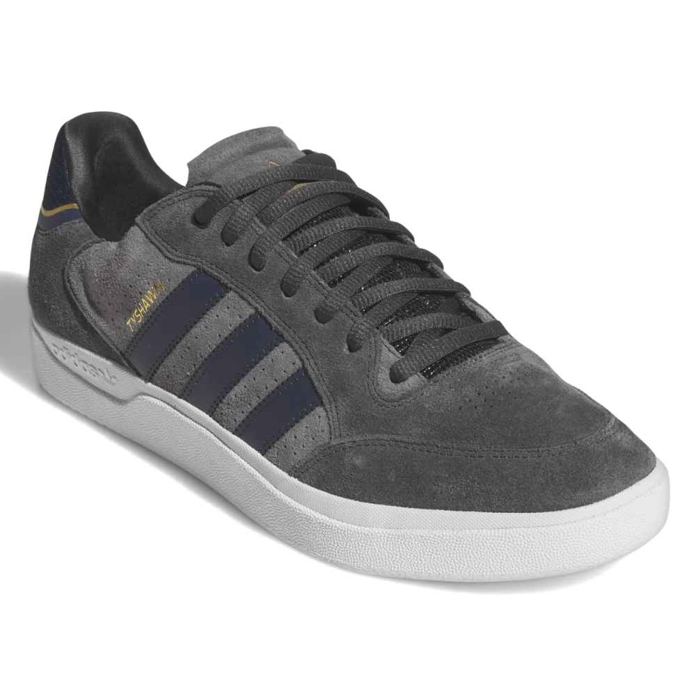 Adidas Skateboarding Tyshawn Low Pro skate shoes in carbon grey and grey five, featuring a low-top design and durable skate shoe construction.