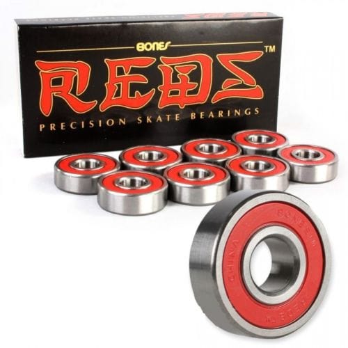 Set of 8 Bones Reds Precision Skate Bearings showing shiny metal bearings for inline and skateboard wheels.