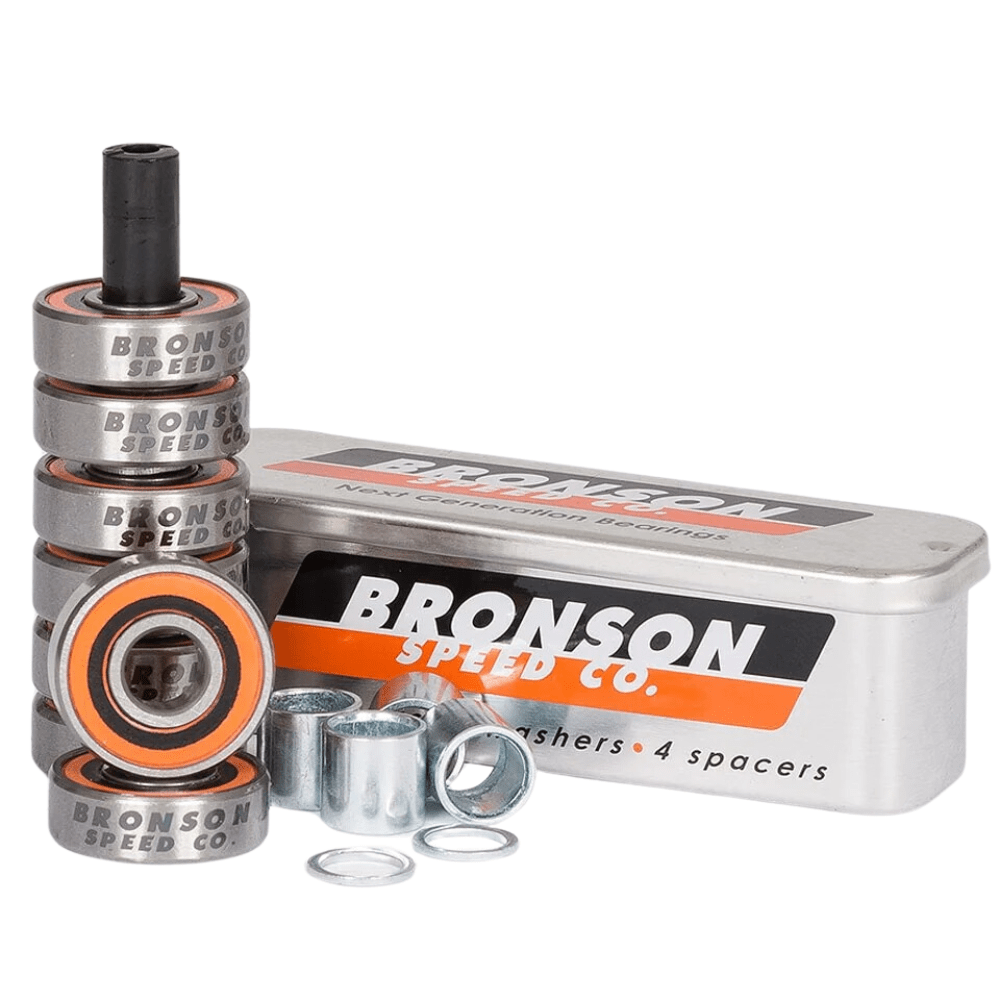 Bronson G3 skateboard bearings showing metal inner and outer races with branding, designed for smooth skateboard wheel rotation.