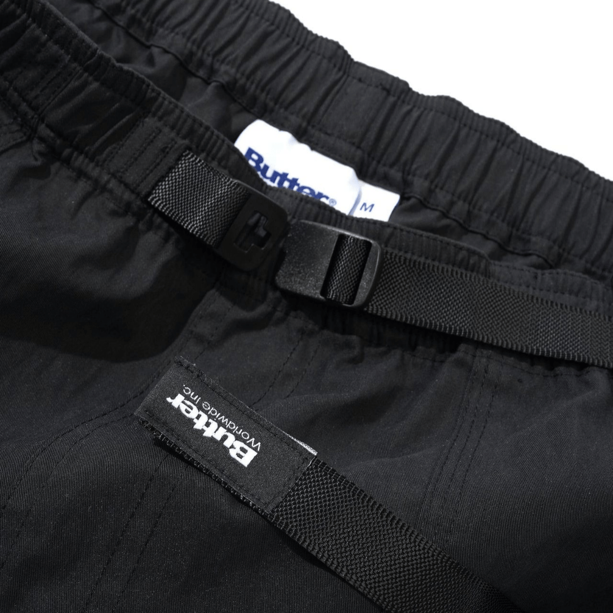 Black Butter Goods Climber Shorts with adjustable waistband and relaxed fit, perfect for casual wear and outdoor activities.