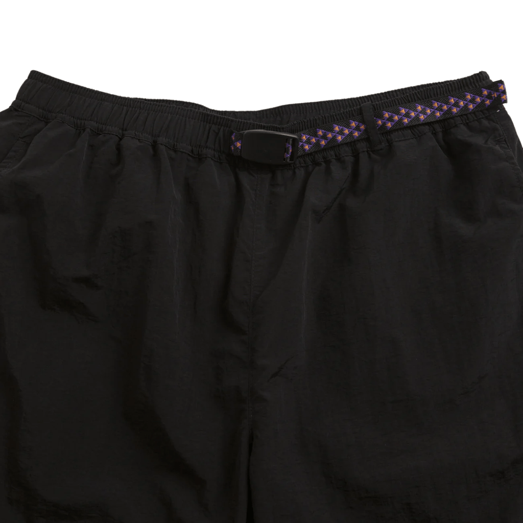 Black Butter Goods Equipment Shorts displayed flat, showing the casual style and durable fabric of these skate-inspired shorts.