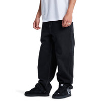 Black DC Baggy Denim Jeans, relaxed fit with classic five-pocket design, made by DC Shoes for casual streetwear style.