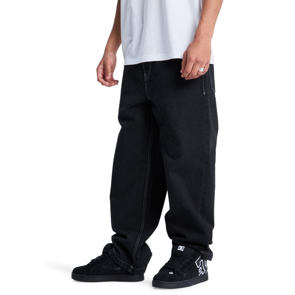 Black DC Baggy Denim Jeans, relaxed fit with classic five-pocket design, made by DC Shoes for casual streetwear style.