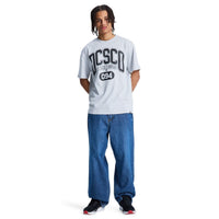 Blue DC Shoes Baggy Denim Jeans displayed with relaxed fit and classic five-pocket style, made from durable denim fabric.