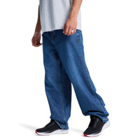 Blue DC Shoes Baggy Denim Jeans with relaxed fit, classic five-pocket style, and branded stitching.