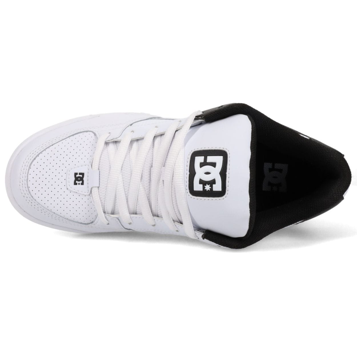 DC Shoes Command skate shoes in white and black with a low-top design and skateboarding-inspired style.