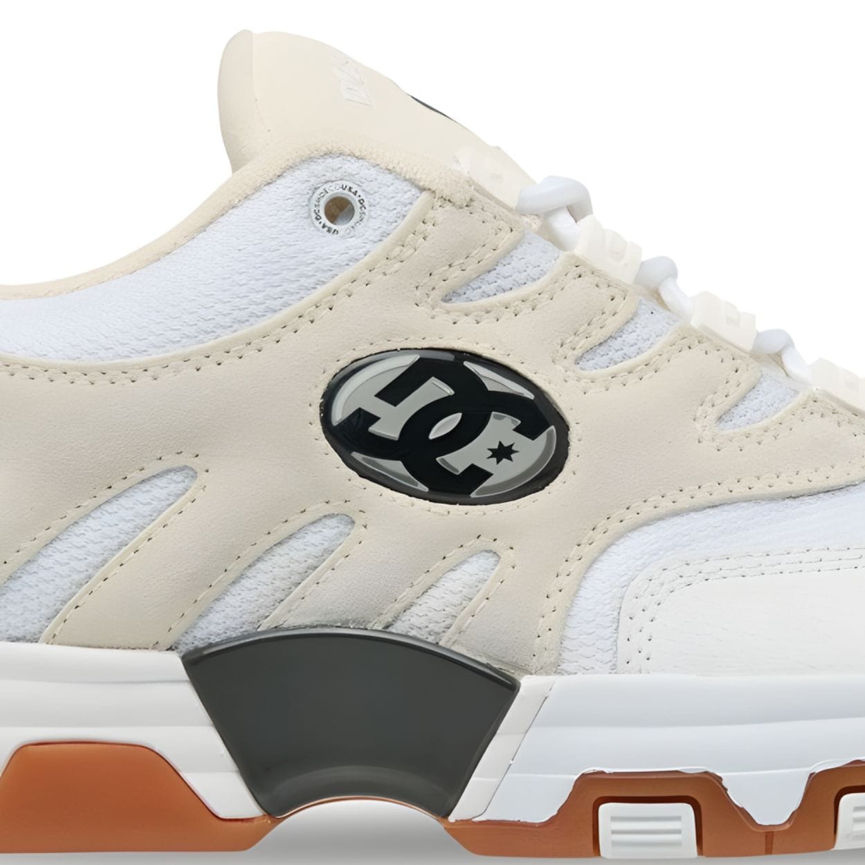Beige DC Hybrid OG skate shoes with classic design, durable sole, and skateboarding-inspired style from DC Shoes.