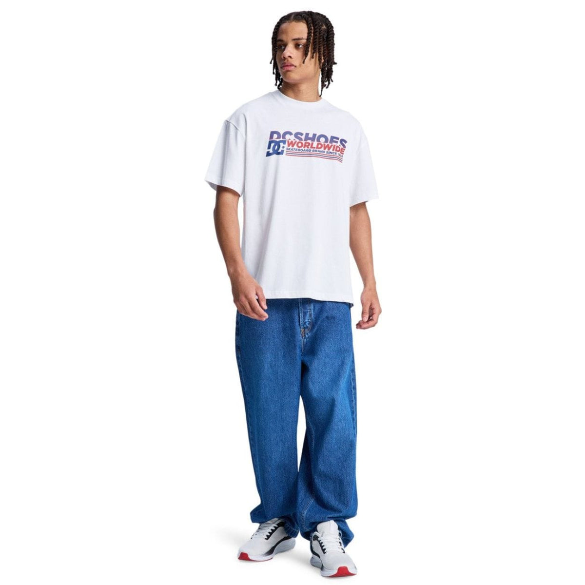 White DC Shoes Queltra Lhss T-Shirt featuring a graphic design, casual fit, and soft cotton fabric for comfortable everyday wear.