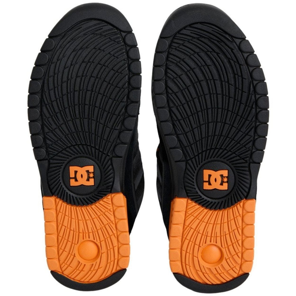 DC Shoes Lucien skate shoes in black and orange, featuring a durable design and classic skateboarding style.