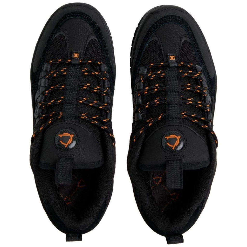 DC Shoes Lucien skate shoes in black and orange with stylish design, durable soles, and classic skateboarding style.