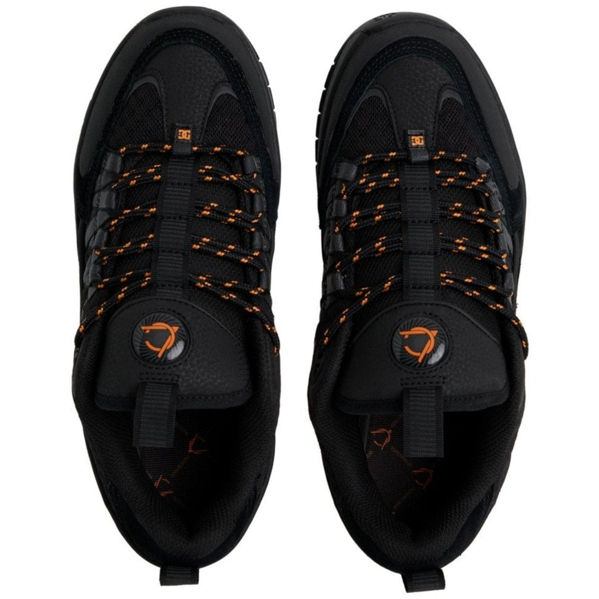DC Shoes Lucien skate shoes in black and orange with stylish design, durable soles, and classic skateboarding style.