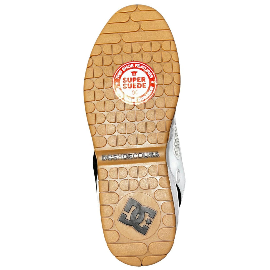 DC Shoes JS 1 skate shoes in white, black, and red with a low-top design and skateboarding style.