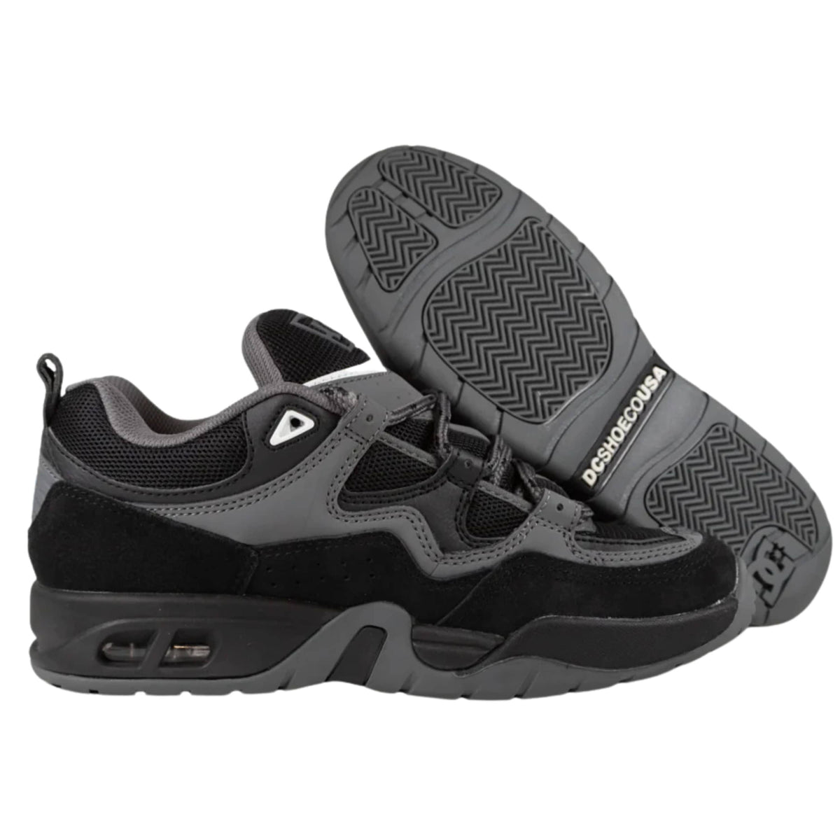 DC Shoes Truth skate shoes in black, grey, and blue with stylish design and skateboarding sole for casual and athletic wear.