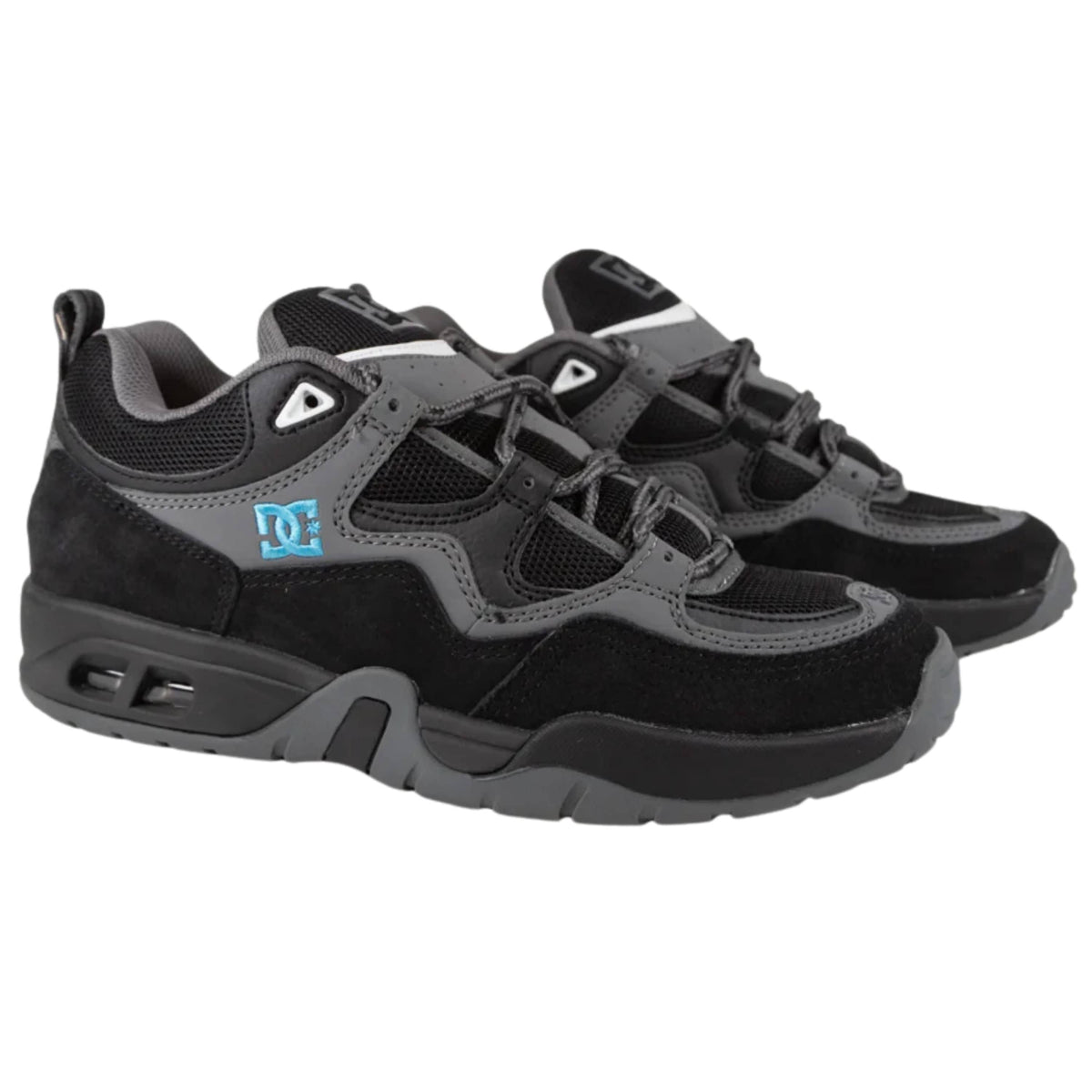 DC Shoes Truth skate shoes in black, grey, and blue with durable design and classic skate style.