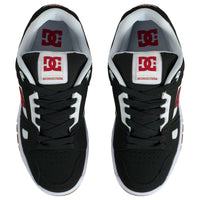 DC Shoes Stag skate shoes in black, white, and red with classic design and skateboarding style.