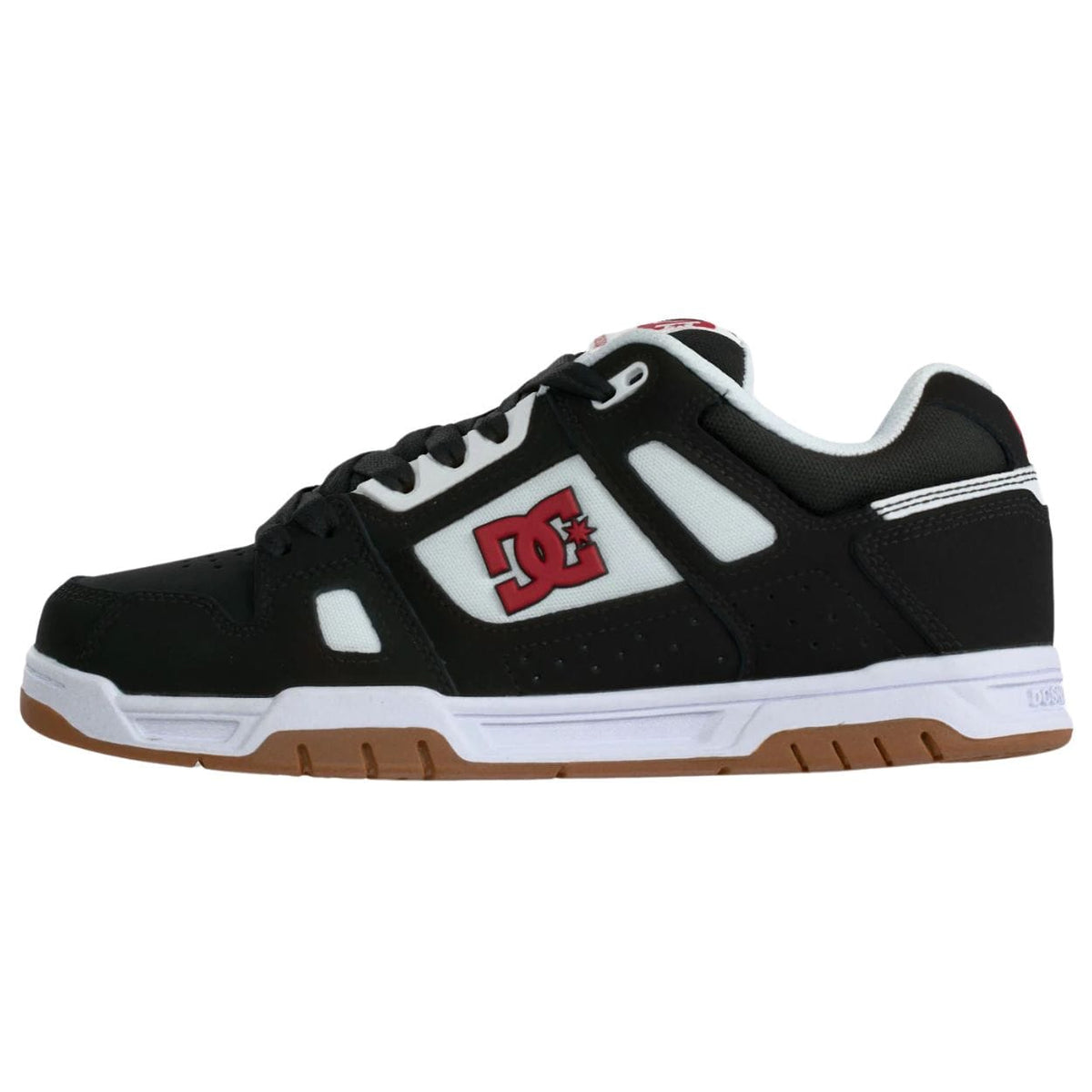 DC Stag skate shoes in black, white, and red with classic skate design and durable construction, perfect for skateboarders.