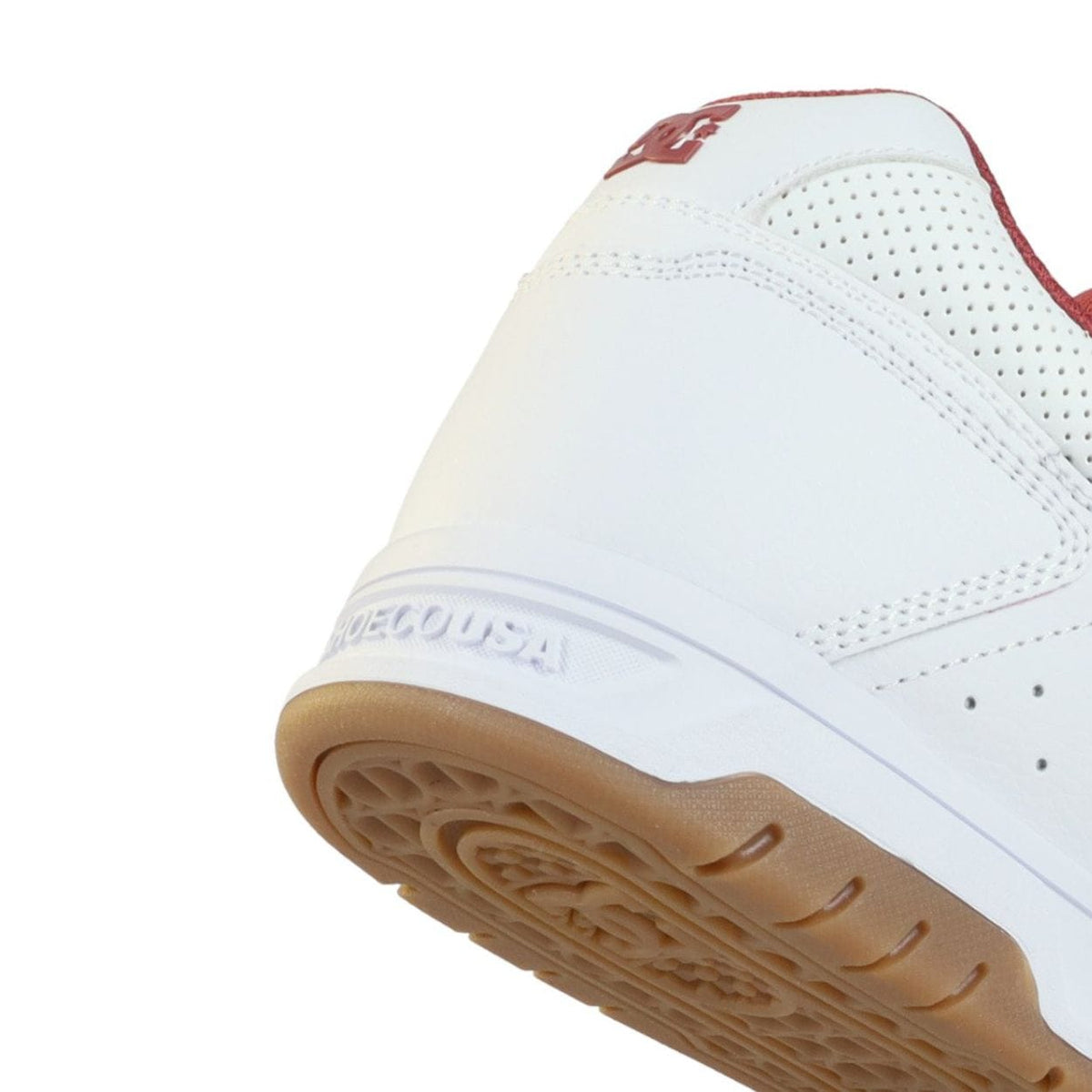 White DC Stag skate shoes featuring classic design and durable construction, ideal for skateboarding and casual wear.