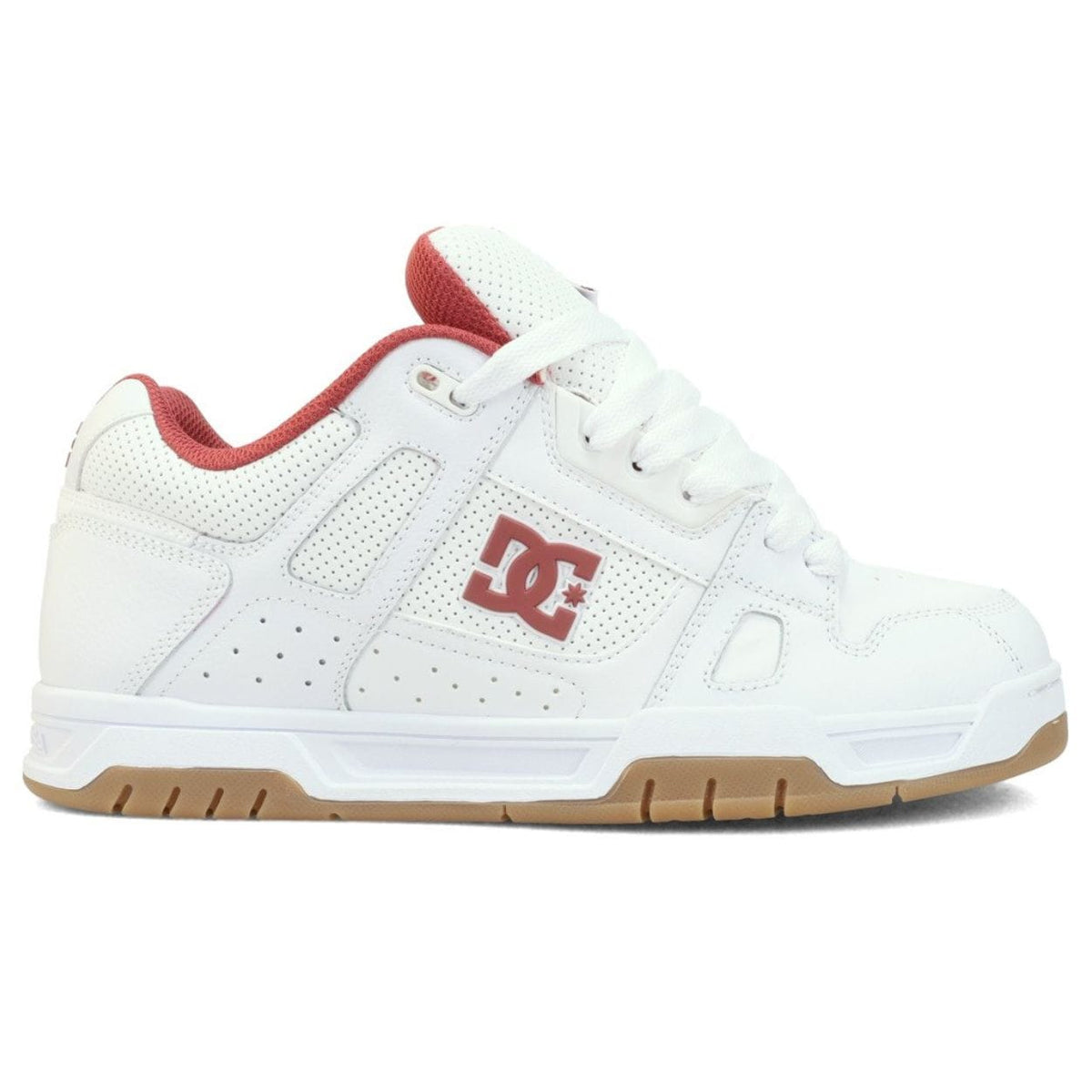 White DC Stag skate shoes with classic design, featuring durable material and skate-ready grip, by DC Shoes.