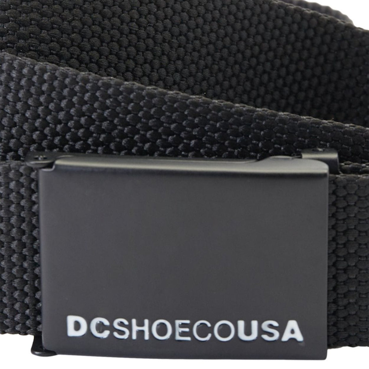 Black DC Web Belt by DC Shoes featuring adjustable strap and metal buckle, designed for casual and skateboarding style.