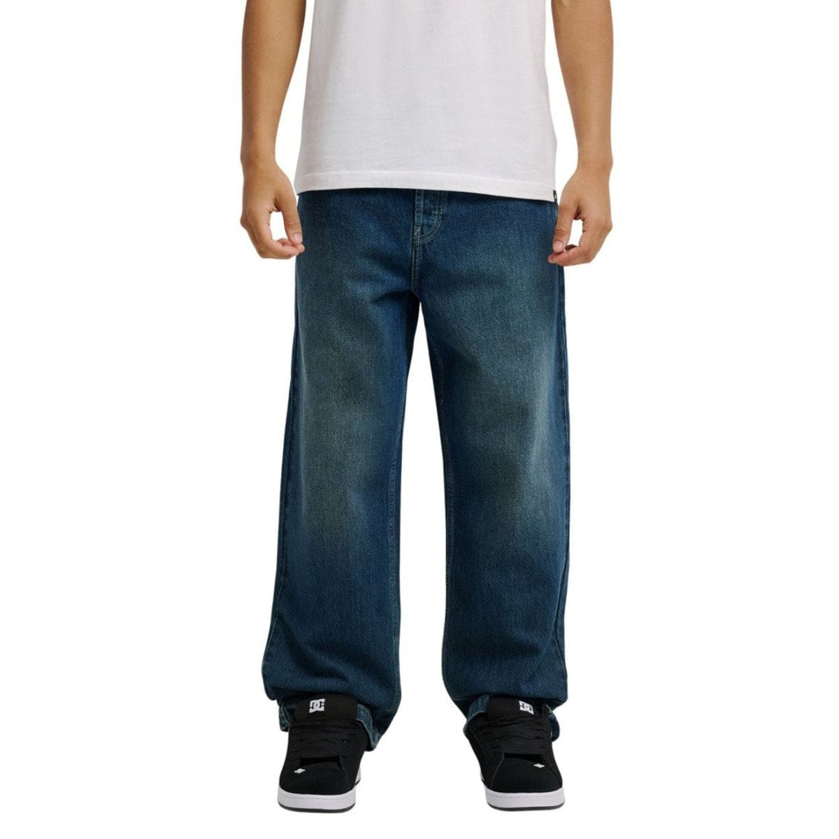 Blue DC Shoes Worker Baggy Double That Denim Jeans, relaxed fit with double-stitched details, displayed on a neutral background.