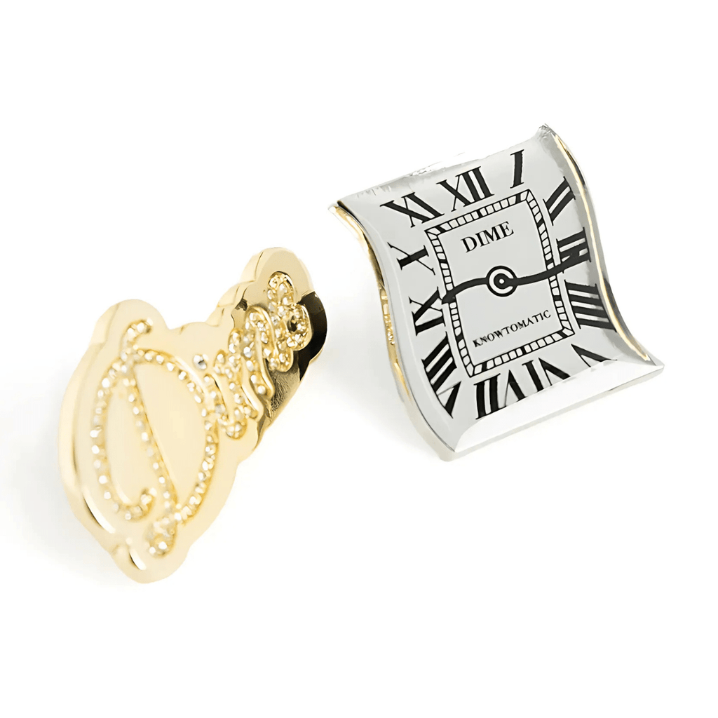 Dime MTL Badge Pack featuring gold and silver enamel pins with Dime MTL branding and various badge designs.