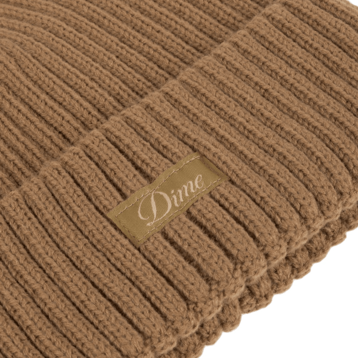 Dime MTL Cursive Fold Beanie in coffee color, stylish knit hat with embroidered logo, perfect for cold weather.