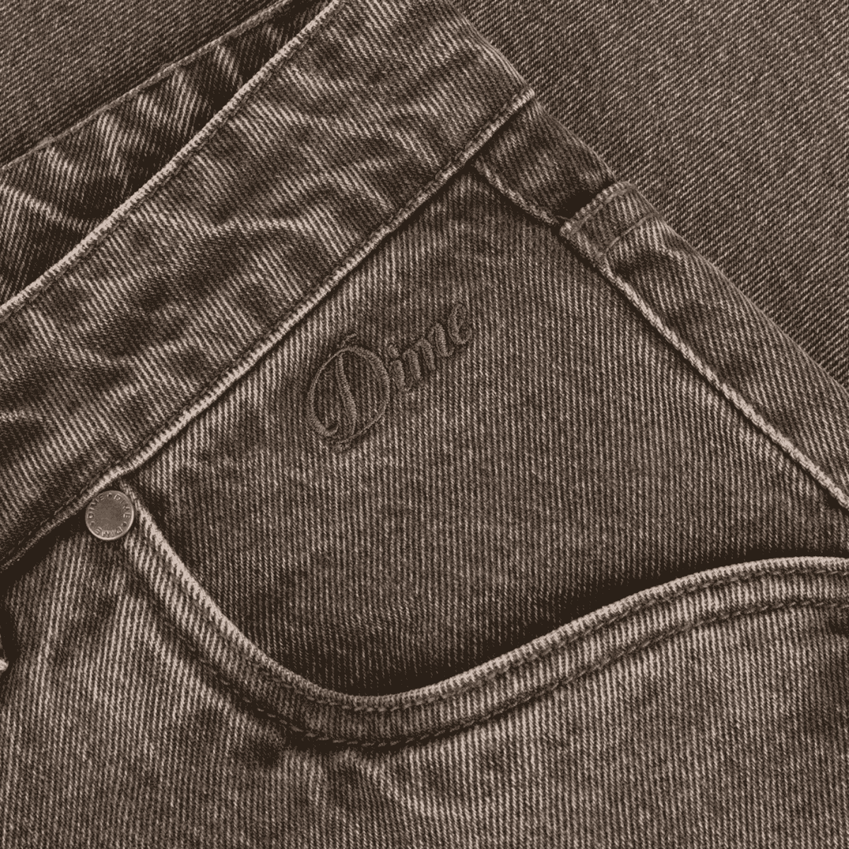 Dime MTL Baggy Denim Pants in Sandblasted Brown with relaxed fit, showcasing distressed details and classic jeans styling.