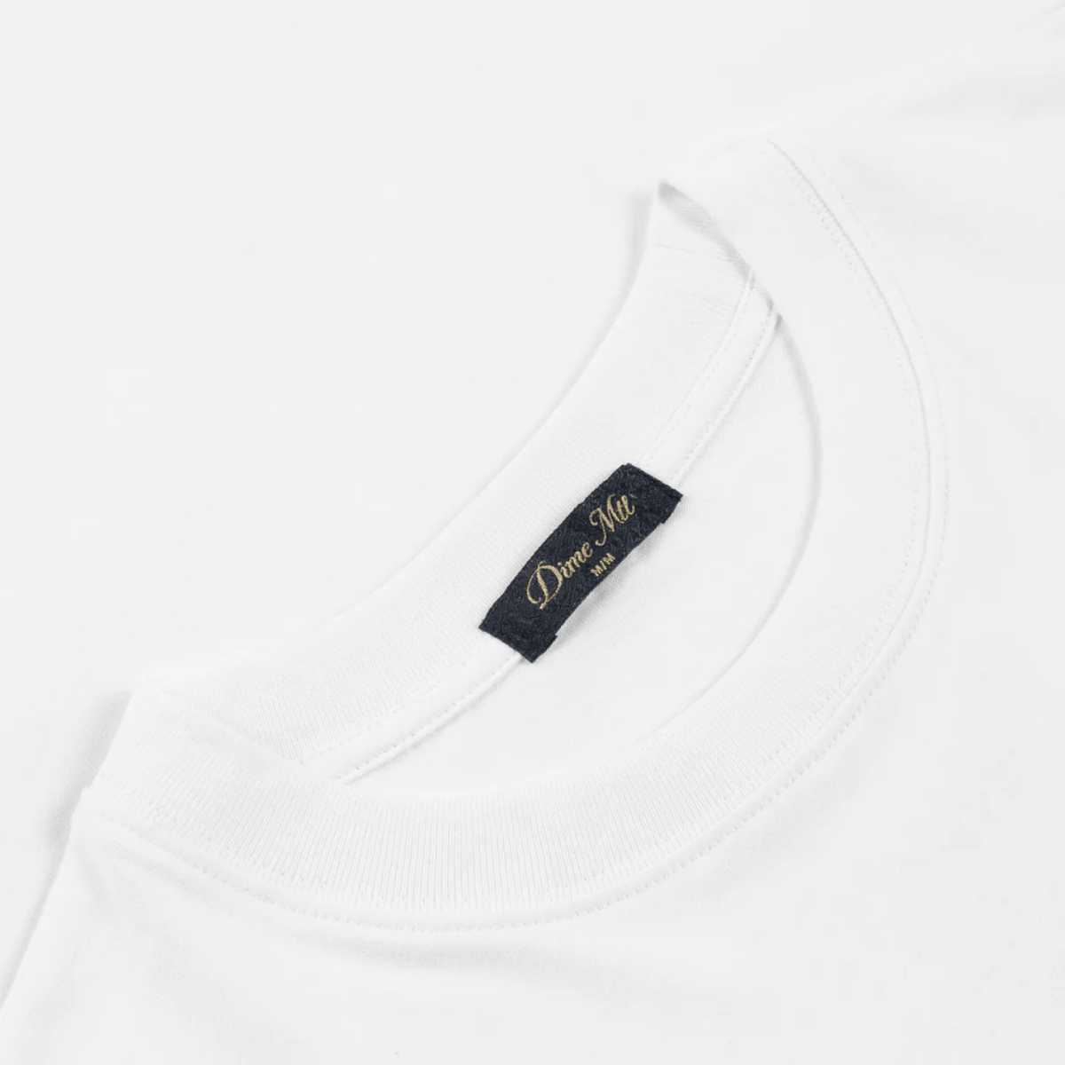 White Dime MTL Glyph T-Shirt featuring a graphic design on the front, made from soft cotton fabric.
