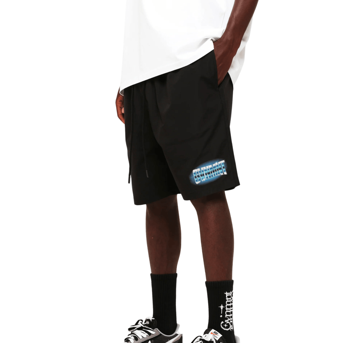 Black GVNMNT Clothing Co Gleam Shorts laid flat, showcasing their stylish design and comfortable fit for casual wear.