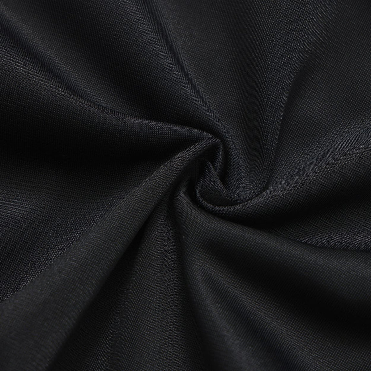 Black Helas Detente tracksuit jacket with zip front, ribbed cuffs and collar, displayed on a hanger.