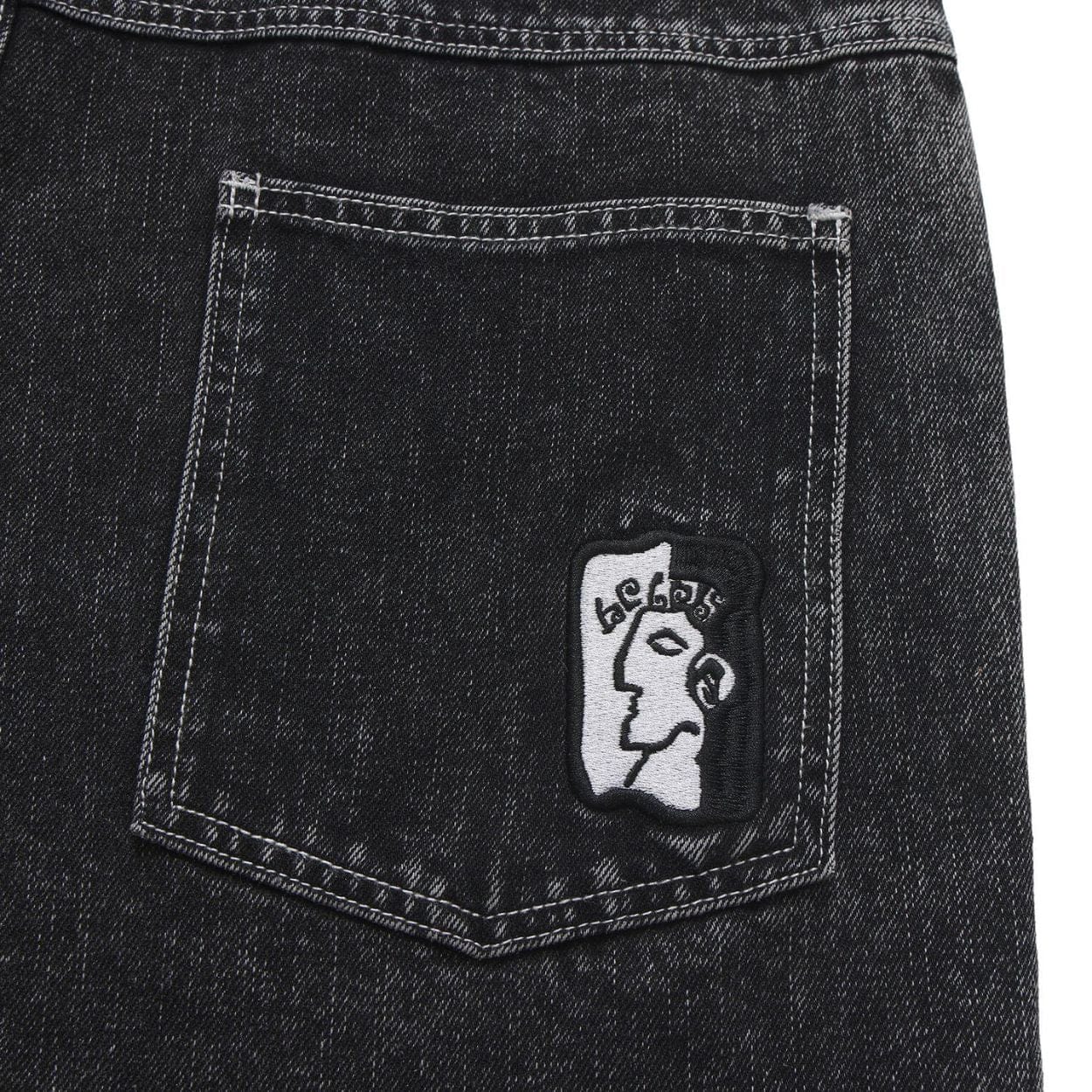 Helas Dieu Grec Jean Shorts in washed black denim, featuring a relaxed fit and distressed details for a casual streetwear look.