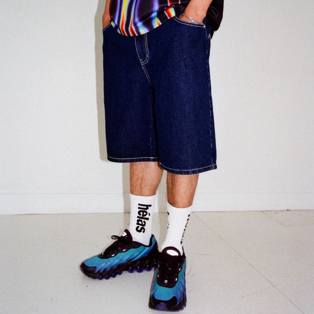 Helas Dieu Grec jean shorts in washed navy with distressed details, casual fit, and frayed hem.