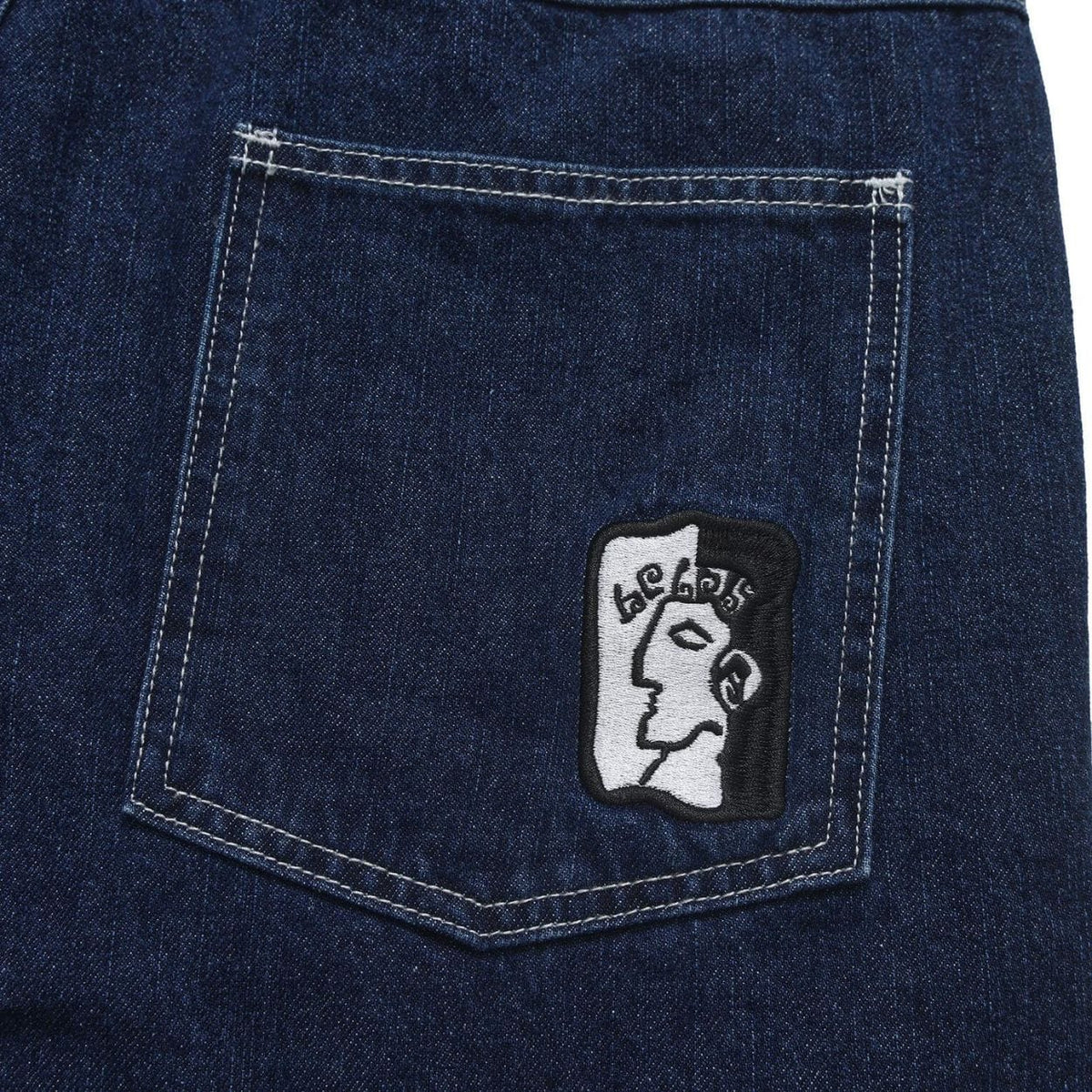 Helas Dieu Grec Jean Shorts in washed navy denim, showcasing a casual fit and distressed details for a stylish summer look.