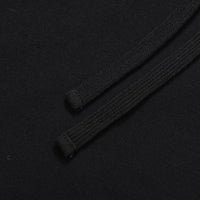 Black Helas Ibiz hoodie with front pocket and logo, featuring a casual fit and soft fabric for comfortable everyday wear.