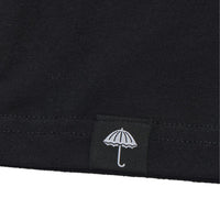 Black Helas Ibiz T-Shirt featuring a casual fit and Helas branding, displayed on a plain background.