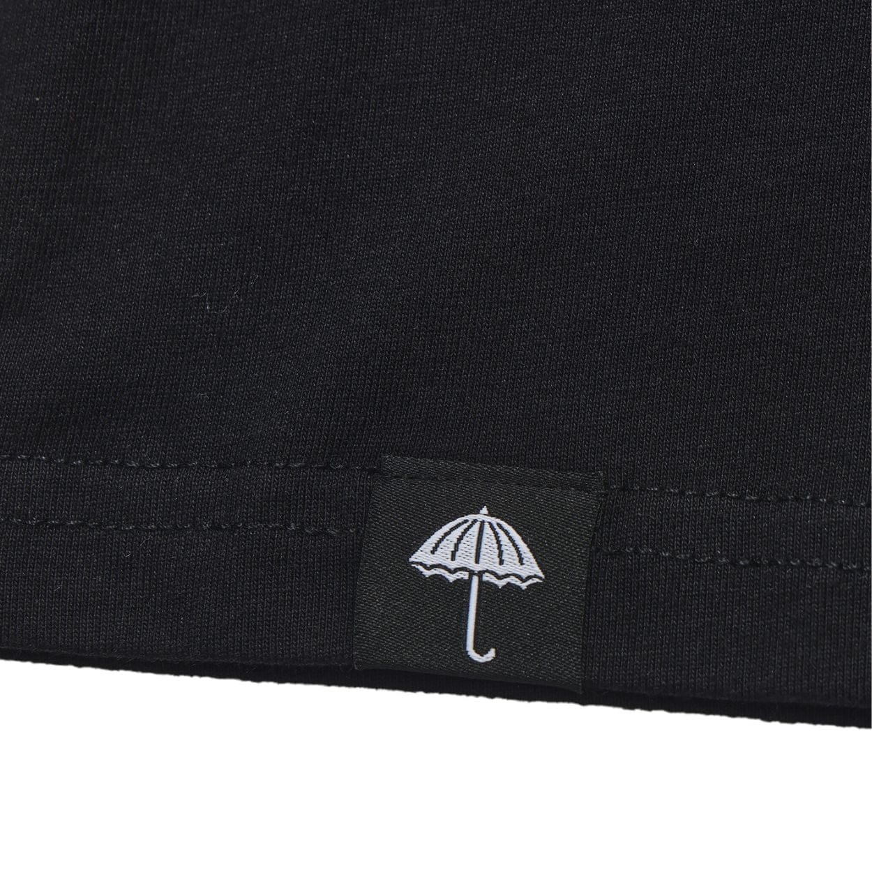 Black Helas Ibiz T-Shirt featuring a casual fit and Helas branding, displayed on a plain background.