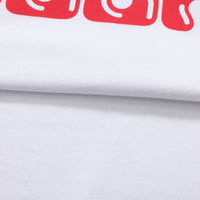 White Helas Ibiz T-Shirt with logo print, casual fit, short sleeves, and crew neckline, made from soft cotton fabric.