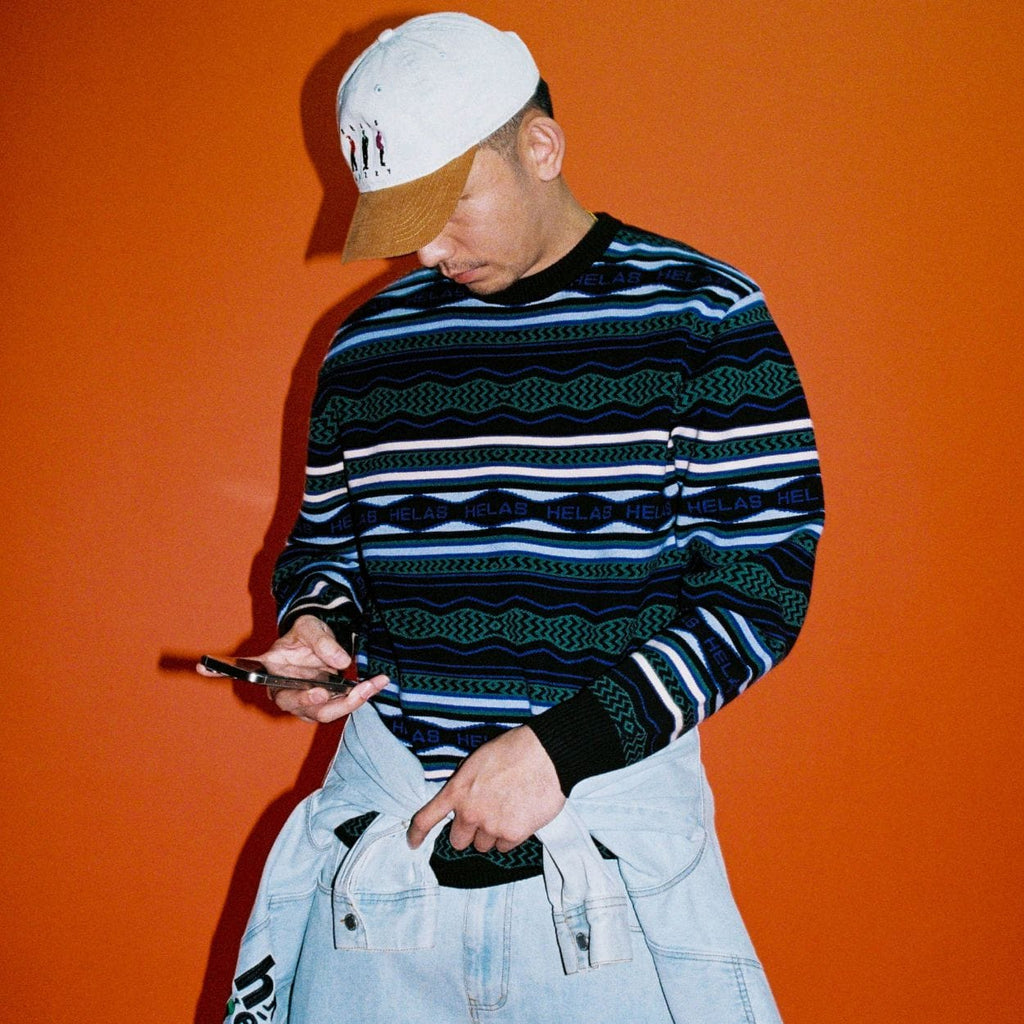 Black Helas Kool Knit Coogi crewneck jumper featuring a textured knit fabric and classic crewneck design.