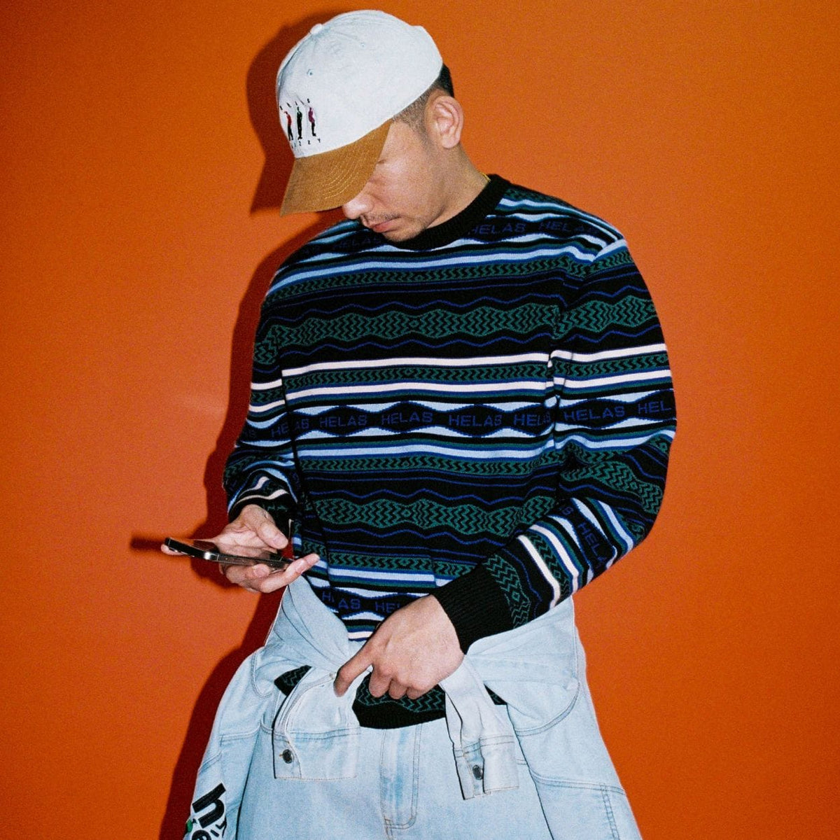 Black Helas Kool Knit Coogi crewneck jumper featuring a textured knit fabric and classic crewneck design.