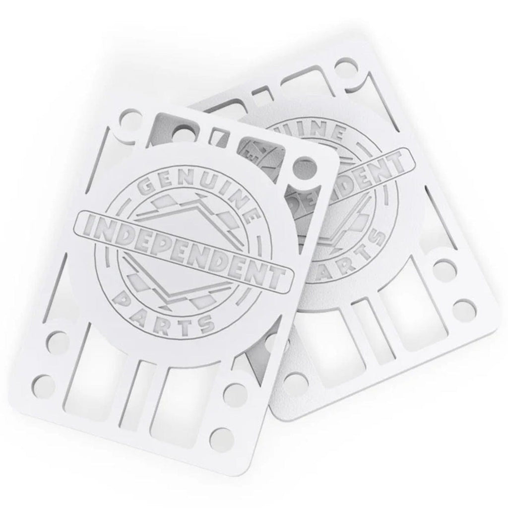 White Independent skateboard riser pads, 1/8 inch thick, designed to elevate and protect skateboard decks during riding.