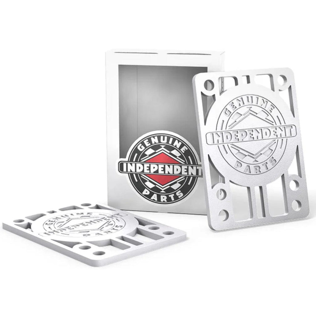 White Independent skateboard riser pads, 1/8 inch thick, designed to elevate and protect skateboard trucks during riding.
