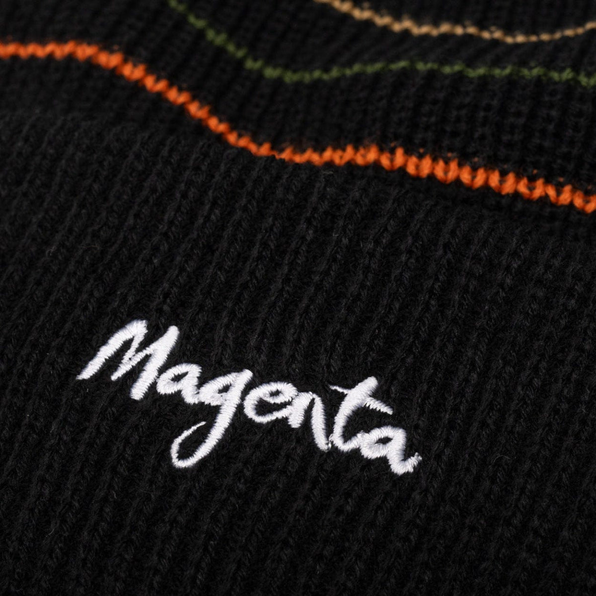 Magenta Skateboards Lines beanie in black, featuring a knit design and logo patch, perfect for casual streetwear style.