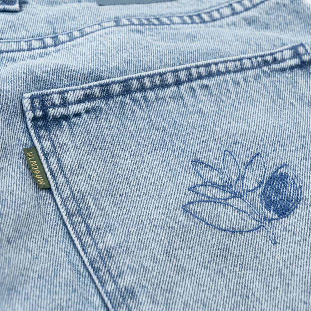 Magenta Skateboard OG denim jeans with washed denim finish and visible stitching, casual fit and classic design.