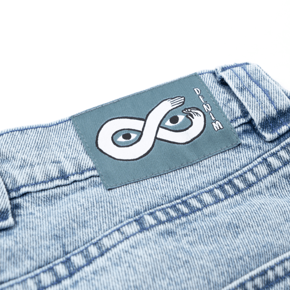 Magenta Skateboard OG denim jeans with washed denim finish and visible white stitching, casual fit and classic style.