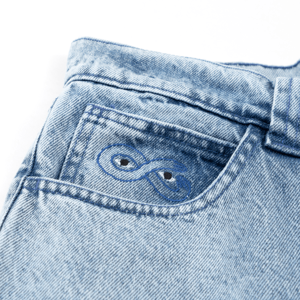 Magenta Skateboard OG denim jeans with white stitching, washed denim finish, slim fit, and classic five-pocket design.