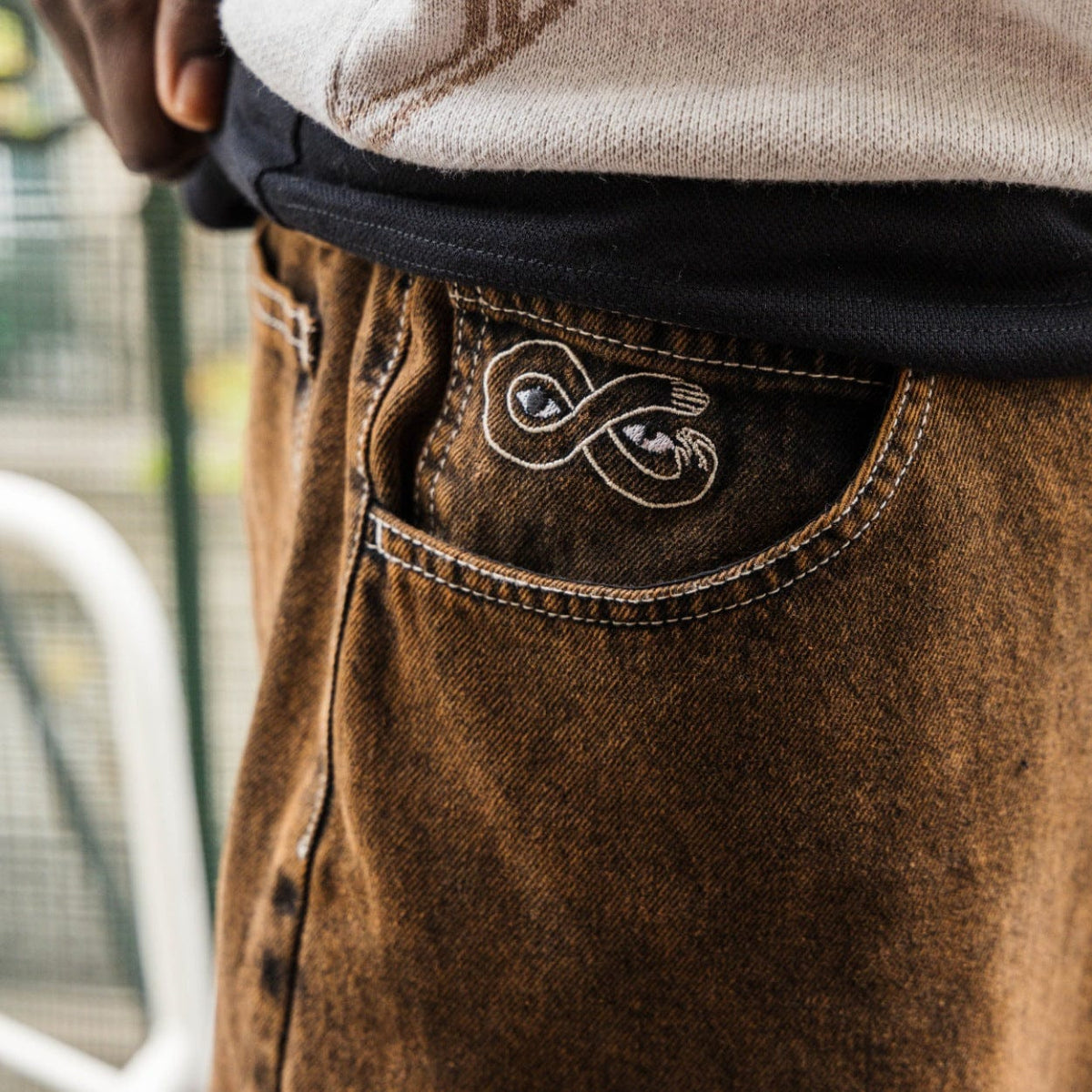 Magenta Skateboards OG Denim Jeans in bronze, featuring classic fit and sturdy denim material, displayed on a plain background.