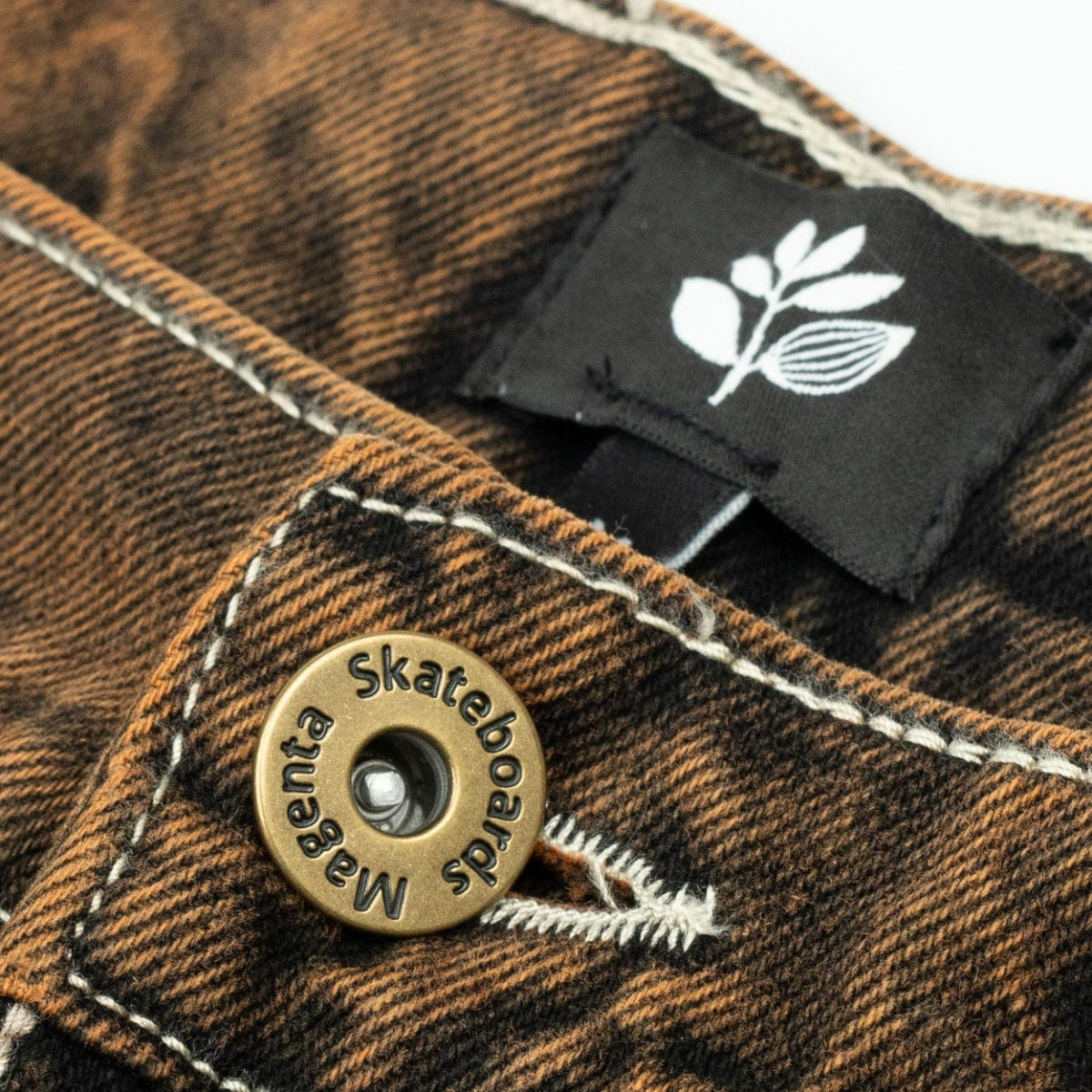 Magenta Skateboards OG Denim Jeans in bronze color, casual fit, with visible stitching and classic denim texture.